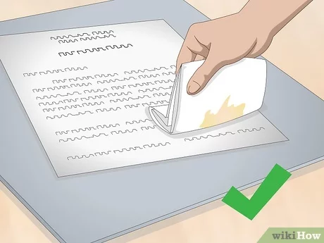 Hoe olievlekken van papier te verwijderen
