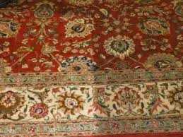 Een Perzisch tapijt schoonmaken
