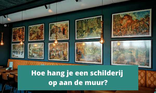 Ingelijste afbeeldingen rangschikken aan een muur